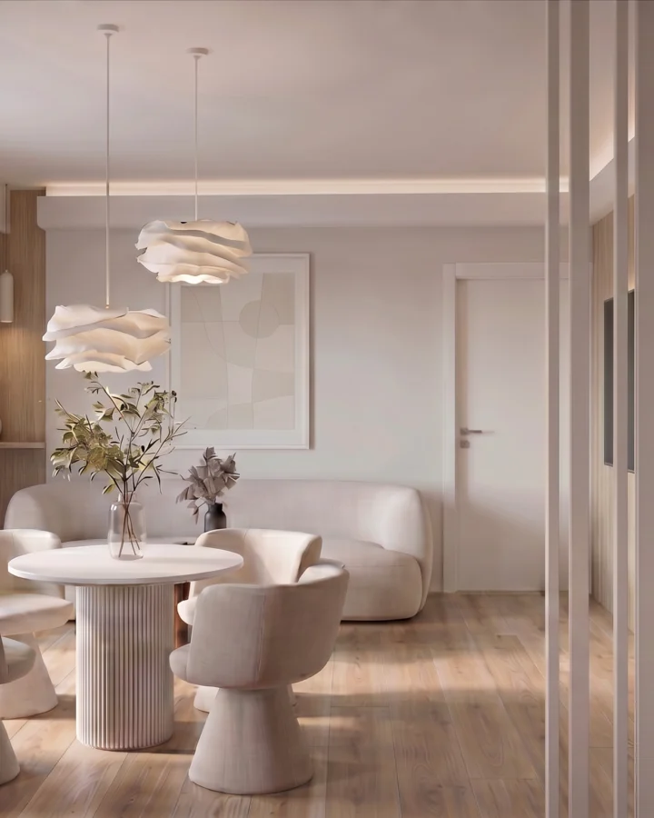 Waiting area with a round table and sculptural pendants, Gynecology Clinic, Marousi – IDYLI Architects